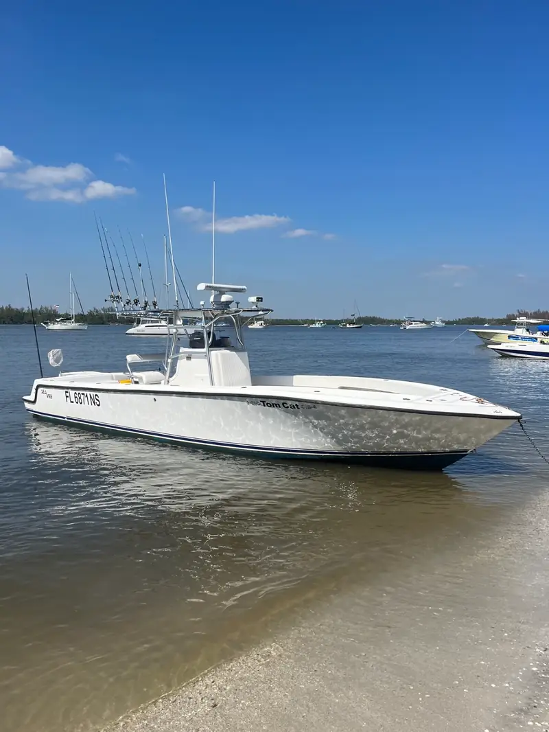 Tom Cat, a 34-foot Sea Vee center console, anchored in clear shallow water off a sandbar on the Intracoastal